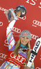Winner Lindsey Vonn of USA celebrates her medal won in women giant slalom race of Audi FIS Alpine skiing World cup in Soelden, Austria. First race of season 2011-2012 was held on Rettenbach glacier above Soelden, Austria, on Saturday, 22nd of October 2011.
