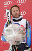 Second placed Bode Miller of USA at the flower ceremony of Men Super-G race of Audi FIS alpine skiing World Cup in Val Gardena, Italy. Super-G race of Men Audi FIS Alpine skiing World Cup 2011 / 2012, was held on Friday, 16th of December 2011, on Saslong course in Val Gardena, Italy. 
