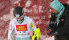 Marcus Sandell of Finland (L) with his coach, Janez Slivnik (R) after DNF in first run of men slalom race of Audi FIS Alpine skiing World cup in Alta Badia, Italy. Men slalom race of Audi FIS Alpine skiing World cup was held on Gran Risa course in Alta Badia, Italy on Monday, 19th of December 2011.
