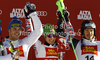 Winner Marcel Hirscher of Austria (M), second placed Giuliano Razzoli of Italy (L) and third placed Felix Neureuther of Germany (R) celebrate their medals won in men slalom race of Audi FIS Alpine skiing World cup in Alta Badia, Italy. Men slalom race of Audi FIS Alpine skiing World cup was held on Gran Risa course in Alta Badia, Italy on Monday, 19th of December 2011.
