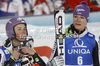 Second placed Maria Hoefl-Riesch of Germany (R) and third placed Tina Maze of Slovenia (L) waiting for second run of winner Marlies Schild of Austria in finish of run of women slalom race of Audi FIS Alpine skiing World cup in Flachau, Austria. Women slalom race of Audi FIS Alpine skiing World cup, which replaced canceled Levi race, was held in Flachau, Austria on Tuesday, 20th of December 2011.

