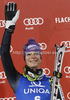 Second placed Maria Hoefl-Riesch of Germany celebrates her medal won in women slalom race of Audi FIS Alpine skiing World cup in Flachau, Austria. Women slalom race of Audi FIS Alpine skiing World cup, which replaced canceled Levi race, was held in Flachau, Austria on Tuesday, 20th of December 2011.
