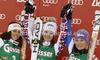 Winner Anna Fenninger of Austria (M), second placed Federica Brignone of Italy (L) and third placed Tessa Worley of France (R) celebrate their medals won in women giant slalom race of Audi FIS Alpine skiing World cup in Lienz, Austria. Women giant slalom race of Audi FIS Alpine skiing World cup was held in Lienz, Austria on Wednesday, 28th of December 2011.
