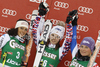 Winner Anna Fenninger of Austria (M), second placed Federica Brignone of Italy (L) and third placed Tessa Worley of France (R) celebrate their medals won in women giant slalom race of Audi FIS Alpine skiing World cup in Lienz, Austria. Women giant slalom race of Audi FIS Alpine skiing World cup was held in Lienz, Austria on Wednesday, 28th of December 2011.
