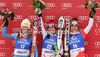 Winner Elisabeth Goergl of Austria (middle), second placed Julia Mancuso of USA (left) and thrid placed Fabienne Suter of Switzerland (right) celebrate their medals won in the Women Downhill race of Audi FIS alpine skiing World Cup in Bad Kleinkirchheim, Austria. Women Downhill race of Women Audi FIS Alpine skiing World Cup 2011 / 2012, was held on Saturday, 7th of Januar 2012, on Kaernten _Franz Klammer course in Bad Kleinkirchheim, Austria.
