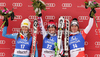 Winner Elisabeth Goergl of Austria (middle), second placed Julia Mancuso of USA (left) and thrid placed Fabienne Suter of Switzerland (right) celebrate their medals won in the Women Downhill race of Audi FIS alpine skiing World Cup in Bad Kleinkirchheim, Austria. Women Downhill race of Women Audi FIS Alpine skiing World Cup 2011 / 2012, was held on Saturday, 7th of Januar 2012, on Kaernten _Franz Klammer course in Bad Kleinkirchheim, Austria.
