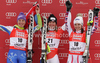 Winner Fabienne Suter of Switzerland (middle), second placed Tina Maze of Slovenia (left) and third placed Anna Fenninger of Austria (right) celebrate their medals won in the Women Super G race of Audi FIS alpine skiing World Cup in Bad Kleinkirchheim, Austria. Women Super G race of Women Audi FIS Alpine skiing World Cup 2011 / 2012, was held on Sunday, 8th of Januar 2012, on Kaernten - Franz Klammer course in Bad Kleinkirchheim, Austria.
