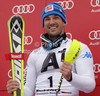 Winner Cristian Deville of Italy celebrates his medal won in the Men Slalom race of Audi FIS alpine skiing World Cup in Kitzbuhel, Austria. Men Slalom race of Men Audi FIS Alpine skiing World Cup 2011 / 2012, was held on Sunday, 22nd of Januar 2012, on Ganslernhang course in Kitzbuhel, Austria.
