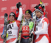 Winner Ivica Kostelic of Croatia (middle), second placed Beat Feuz of Switzerland (left) and third placed Silvan Zurbriggen of Switzerland (right) celebrate their medals won in the Men Combination race of Audi FIS alpine skiing World Cup in Kitzbuhel, Austria. Men Combination race of Men Audi FIS Alpine skiing World Cup 2011 / 2012, was held on Sunday, 22nd of Januar 2012, on Ganslernhang course in Kitzbuhel, Austria.
