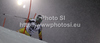 Trevor White of Canada skiing in first run of men slalom race of Audi FIS Alpine skiing World cup in Schladming, Austria. Traditional The Nightrace, men slalom race of Audi FIS Alpine skiing World cup, was held in Schladming, Austria, on Tuesday, 24th of January 2012.
