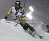 Trevor White of Canada skiing in first run of men slalom race of Audi FIS Alpine skiing World cup in Schladming, Austria. Traditional The Nightrace, men slalom race of Audi FIS Alpine skiing World cup, was held in Schladming, Austria, on Tuesday, 24th of January 2012.
