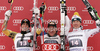 Winner Didier Cuche of Switzerland (M), second placed Erik Guay of Canada (L) and third placed Hannes Reichelt of Austria (R) celebrate their medals won in men downhill race of Audi FIS Alpine skiing World cup in Garmisch-Partenkirchen, Germany. Men downhill race of Audi FIS Alpine skiing World cup, was held in Garmisch-Partenkirchen, Germany, on Saturday, 28th of January 2012.

