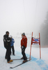 Men FIS alpine skiing World cup assistant referee Helmut Schmalz discussing course conditions with coaches before start of men super-g race of Audi FIS Alpine skiing World cup in Garmisch-Partenkirchen, Germany, which was canceled due too much of fog on course. Men super-g race of Audi FIS Alpine skiing World cup, was planed to be held in Garmisch-Partenkirchen, Germany, on Sunday, 29th of January 2012.
