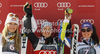 Winner Viktoria Rebensburg of Germany (M), second placed Lindsey Vonn of USA (L) and third placed Tina Maze of Slovenia (R) celebrate their medals won in women giant slalom race of Audi FIS Alpine skiing World cup in Ofterschwang, Germany. Women giant slalom race of Audi FIS Alpine skiing World cup was held in Ofterschwang, Germany, on Saturday, 3rd of March 2012.

