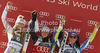 Winner Viktoria Rebensburg of Germany (M), second placed Lindsey Vonn of USA (L) and third placed Tina Maze of Slovenia (R) celebrate their medals won in women giant slalom race of Audi FIS Alpine skiing World cup in Ofterschwang, Germany. Women giant slalom race of Audi FIS Alpine skiing World cup was held in Ofterschwang, Germany, on Saturday, 3rd of March 2012.
