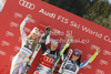 Winner Viktoria Rebensburg of Germany (M), second placed Lindsey Vonn of USA (L) and third placed Tina Maze of Slovenia (R) celebrate their medals won in women giant slalom race of Audi FIS Alpine skiing World cup in Ofterschwang, Germany. Women giant slalom race of Audi FIS Alpine skiing World cup was held in Ofterschwang, Germany, on Saturday, 3rd of March 2012.
