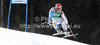 Overall third placed Didier Cuche of Switzerland skiing in men downhill race of Audi FIS Alpine skiing World cup finals in Schladming, Austria. Men downhill race of Audi FIS Alpine skiing World cup finals was held in Schladming, Austria, on Wednesday, 14th of March 2012.
