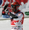 Didier Cuche of Switzerland celebrates his last run in career in finish of men Super-G race of Audi FIS Alpine skiing World cup finals in Schladming, Austria. Men Super-G race of Audi FIS Alpine skiing World cup finals was held in Schladming, Austria, on Thursday, 15th of March 2012.
