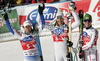 Winner Christof Innerhofer of Italy (m), Second placed Alexis Pinturault of France (L), Thirdh placed Marcel Hirscher of Austria (R) celebrates their medals won in men Super-G race of Audi FIS Alpine skiing World cup finals in Schladming, Austria. Men Super-G race of Audi FIS Alpine skiing World cup finals was held in Schladming, Austria, on Thursday, 15th of March 2012.
