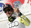 Aksel Lund Svindal of Norway celebrates his overall victory in men Super-G Audi FIS Alpine skiing World cup finals in Schladming, Austria. Last men Super-G race of Audi FIS Alpine skiing World cup finals was held in Schladming, Austria, on Thursday, 15th of March 2012.
