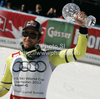 Aksel Lund Svindal of Norway celebrates his overall victory in men Super-G Audi FIS Alpine skiing World cup finals in Schladming, Austria. Last men Super-G race of Audi FIS Alpine skiing World cup finals was held in Schladming, Austria, on Thursday, 15th of March 2012.

