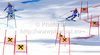Cyprien Richard of France (R) and Nolan Kasper of USA (L) skiing in team event race of Audi FIS Alpine skiing World cup finals in Schladming, Austria. Team event race of Audi FIS Alpine skiing World cup finals was held in Schladming, Austria, on Friday, 16th of March 2012.
