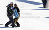 Resi Stiegler of USA is taken off the course by her coaches after crashing and getting injured in team event race of Audi FIS Alpine skiing World cup finals in Schladming, Austria. Team event race of Audi FIS Alpine skiing World cup finals was held in Schladming, Austria, on Friday, 16th of March 2012.
