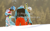 Tanja Poutiainen of Finland (L) with her coach Luca Moretti (M) and her physio Saija Maattar (R) after DNF in first run of women slalom race of Audi FIS Alpine skiing World cup finals in Schladming, Austria. Women slalom race of Audi FIS Alpine skiing World cup finals was held in Schladming, Austria, on Saturday, 17th of March 2012.
