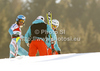 Tanja Poutiainen of Finland (L) with her coach Luca Moretti (M) and her physio Saija Maattar (R) after DNF in first run of women slalom race of Audi FIS Alpine skiing World cup finals in Schladming, Austria. Women slalom race of Audi FIS Alpine skiing World cup finals was held in Schladming, Austria, on Saturday, 17th of March 2012.
