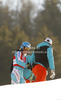 Tanja Poutiainen of Finland (L) with her coach Luca Moretti (M) and her physio Saija Maattar (R) after DNF in first run of women slalom race of Audi FIS Alpine skiing World cup finals in Schladming, Austria. Women slalom race of Audi FIS Alpine skiing World cup finals was held in Schladming, Austria, on Saturday, 17th of March 2012.
