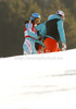 Tanja Poutiainen of Finland (L) with her coach Luca Moretti (M) and her physio Saija Maattar (R) after DNF in first run of women slalom race of Audi FIS Alpine skiing World cup finals in Schladming, Austria. Women slalom race of Audi FIS Alpine skiing World cup finals was held in Schladming, Austria, on Saturday, 17th of March 2012.
