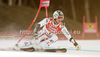 Hannes Reichelt of Austria skiing in first run of men giant slalom race of Audi FIS Alpine skiing World cup finals in Schladming, Austria. Men giant slalom race of Audi FIS Alpine skiing World cup finals was held in Schladming, Austria, on Saturday, 17th of March 2012.
