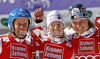 Winner Michaela Kirchgasser of Austria (M), second placed Veronika Zuzulova of Slovakia (L) and third placed Marlies Schild of Austria (R) celebrate their medals won in women slalom race of Audi FIS Alpine skiing World cup finals in Schladming, Austria. Women slalom race of Audi FIS Alpine skiing World cup finals was held in Schladming, Austria, on Saturday, 17th of March 2012.

