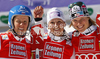 Winner Michaela Kirchgasser of Austria (M), second placed Veronika Zuzulova of Slovakia (L) and third placed Marlies Schild of Austria (R) celebrate their medals won in women slalom race of Audi FIS Alpine skiing World cup finals in Schladming, Austria. Women slalom race of Audi FIS Alpine skiing World cup finals was held in Schladming, Austria, on Saturday, 17th of March 2012.
