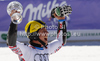 Overall giant slalom FIS World cup winner Marcel Hirscher of Austria celebrates his trophy after second run of men giant slalom race of Audi FIS Alpine skiing World cup finals in Schladming, Austria. Men giant slalom race of Audi FIS Alpine skiing World cup finals was held in Schladming, Austria, on Saturday, 17th of March 2012.
