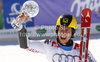 Overall giant slalom FIS World cup winner Marcel Hirscher of Austria celebrates his trophy after second run of men giant slalom race of Audi FIS Alpine skiing World cup finals in Schladming, Austria. Men giant slalom race of Audi FIS Alpine skiing World cup finals was held in Schladming, Austria, on Saturday, 17th of March 2012.
