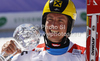 Overall giant slalom FIS World cup winner Marcel Hirscher of Austria celebrates his trophy after second run of men giant slalom race of Audi FIS Alpine skiing World cup finals in Schladming, Austria. Men giant slalom race of Audi FIS Alpine skiing World cup finals was held in Schladming, Austria, on Saturday, 17th of March 2012.
