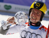 Overall giant slalom FIS World cup winner Marcel Hirscher of Austria celebrates his trophy after second run of men giant slalom race of Audi FIS Alpine skiing World cup finals in Schladming, Austria. Men giant slalom race of Audi FIS Alpine skiing World cup finals was held in Schladming, Austria, on Saturday, 17th of March 2012.
