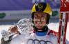 Overall giant slalom FIS World cup winner Marcel Hirscher of Austria celebrates his trophy after second run of men giant slalom race of Audi FIS Alpine skiing World cup finals in Schladming, Austria. Men giant slalom race of Audi FIS Alpine skiing World cup finals was held in Schladming, Austria, on Saturday, 17th of March 2012.
