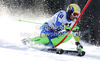 Mitja Valencic of Slovenia skiing in first run of men slalom race of Audi FIS Alpine skiing World cup finals in Schladming, Austria. Men slalom race of Audi FIS Alpine skiing World cup finals was held in Schladming, Austria, on Sunday, 18th of March 2012.
