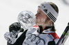 Overall giant slalom World cup winner Viktoria Rebensburg of Germany celebrates her trophy after end of last women giant slalom race of Audi FIS Alpine skiing World cup finals in Schladming, Austria. Women giant slalom race of Audi FIS Alpine skiing World cup finals was held in Schladming, Austria, on Sunday, 18th of March 2012.
