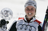 Overall giant slalom World cup winner Viktoria Rebensburg of Germany celebrates her trophy after end of last women giant slalom race of Audi FIS Alpine skiing World cup finals in Schladming, Austria. Women giant slalom race of Audi FIS Alpine skiing World cup finals was held in Schladming, Austria, on Sunday, 18th of March 2012.
