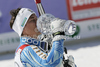 Overall slalom World cup winner Andre Myhrer of Sweden celebrates his trophy after last men slalom race of Audi FIS Alpine skiing World cup finals in Schladming, Austria. Men slalom race of Audi FIS Alpine skiing World cup finals was held in Schladming, Austria, on Sunday, 18th of March 2012.
