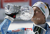 Overall slalom World cup winner Andre Myhrer of Sweden celebrates his trophy after last men slalom race of Audi FIS Alpine skiing World cup finals in Schladming, Austria. Men slalom race of Audi FIS Alpine skiing World cup finals was held in Schladming, Austria, on Sunday, 18th of March 2012.
