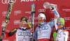 Winner Andre Myhrer of Sweden (M), second placed Ivica Kostelic of Croatia (L) and third placed Marcel Hirscher of Austria (R) celebrate their overall slalom World cup medals after men slalom race of Audi FIS Alpine skiing World cup finals in Schladming, Austria. Men slalom race of Audi FIS Alpine skiing World cup finals was held in Schladming, Austria, on Sunday, 18th of March 2012.
