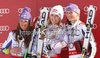 Overall FIS alpine skiing World cup winner Lindsey Vonn of USA (M), second placed Tina Maze of Slovenia (L) and third placed Maria Hoefl-Riesch of Germany (R) celebrate their medals after last race of Audi FIS Alpine skiing World cup finals in Schladming, Austria. Last women race of Audi FIS Alpine skiing World cup finals was held in Schladming, Austria, on Sunday, 18th of March 2012.
