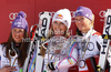 Overall FIS alpine skiing World cup winner Lindsey Vonn of USA (M), second placed Tina Maze of Slovenia (L) and third placed Maria Hoefl-Riesch of Germany (R) celebrate their medals after last race of Audi FIS Alpine skiing World cup finals in Schladming, Austria. Last women race of Audi FIS Alpine skiing World cup finals was held in Schladming, Austria, on Sunday, 18th of March 2012.
