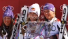 Overall FIS alpine skiing World cup winner Lindsey Vonn of USA (M), second placed Tina Maze of Slovenia (L) and third placed Maria Hoefl-Riesch of Germany (R) celebrate their medals after last race of Audi FIS Alpine skiing World cup finals in Schladming, Austria. Last women race of Audi FIS Alpine skiing World cup finals was held in Schladming, Austria, on Sunday, 18th of March 2012.
