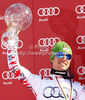 Overall FIS alpine skiing World cup winner Marcel Hirscher of Austria celebrates his trophy after last race of Audi FIS Alpine skiing World cup finals in Schladming, Austria. Last men race of Audi FIS Alpine skiing World cup finals was held in Schladming, Austria, on Sunday, 18th of March 2012.
