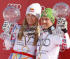 Overall Men FIS alpine skiing World cup winner Marcel Hirscher of Austria (R) and overall Women FIS alpine skiing World cup winner Lindsey Vonn of USA celebrate their trophies after last race of Audi FIS Alpine skiing World cup finals in Schladming, Austria. Last race of Audi FIS Alpine skiing World cup finals was held in Schladming, Austria, on Sunday, 18th of March 2012.
